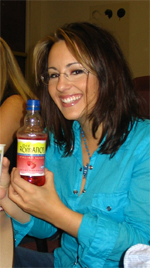 Woman with Romano's soda in her hand.